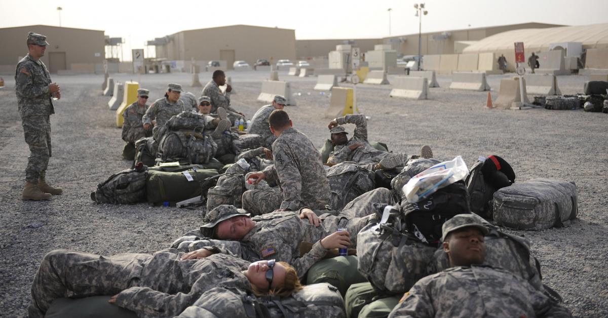 Soldiers resting before deployment