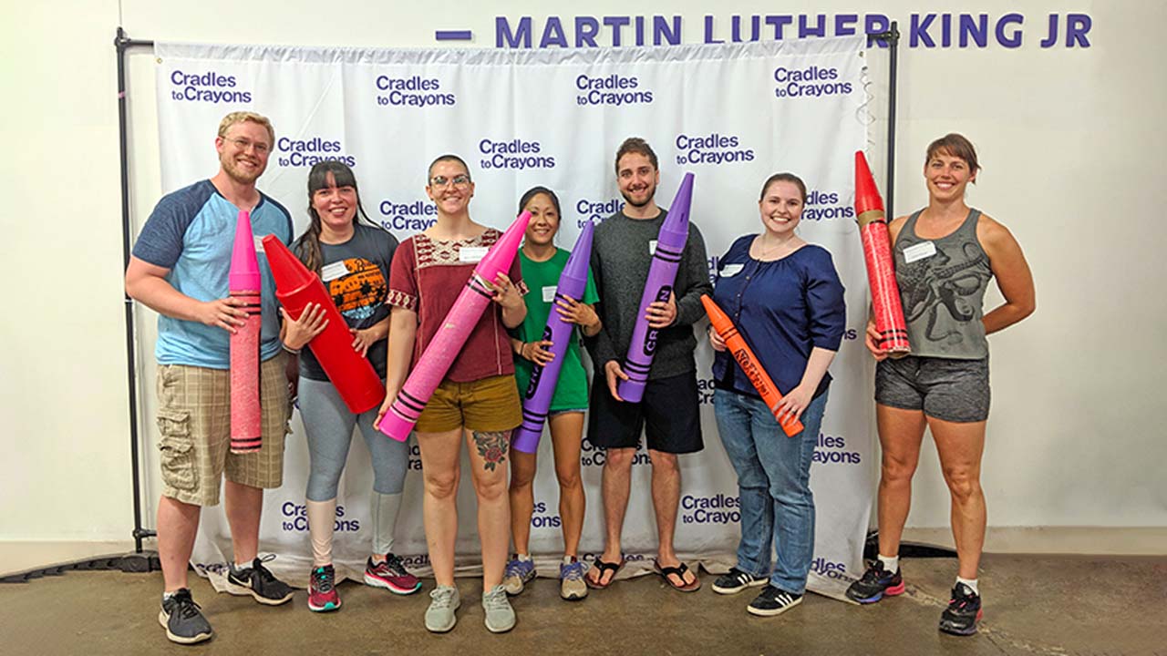 Giving Back to Boston Staff from Charles River Analytics Volunteer at