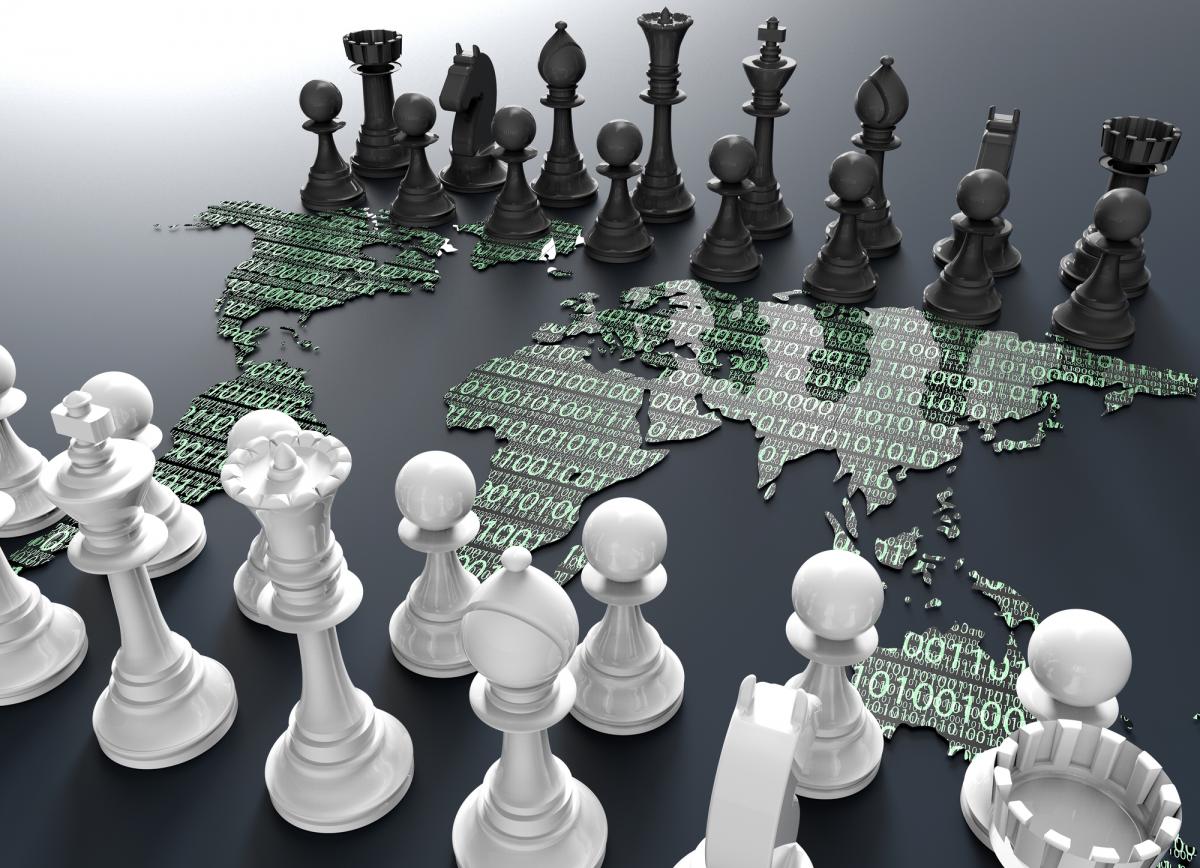 Image of chess pieces and circuit board, illustration for Charles River Analytics SHEATH project.